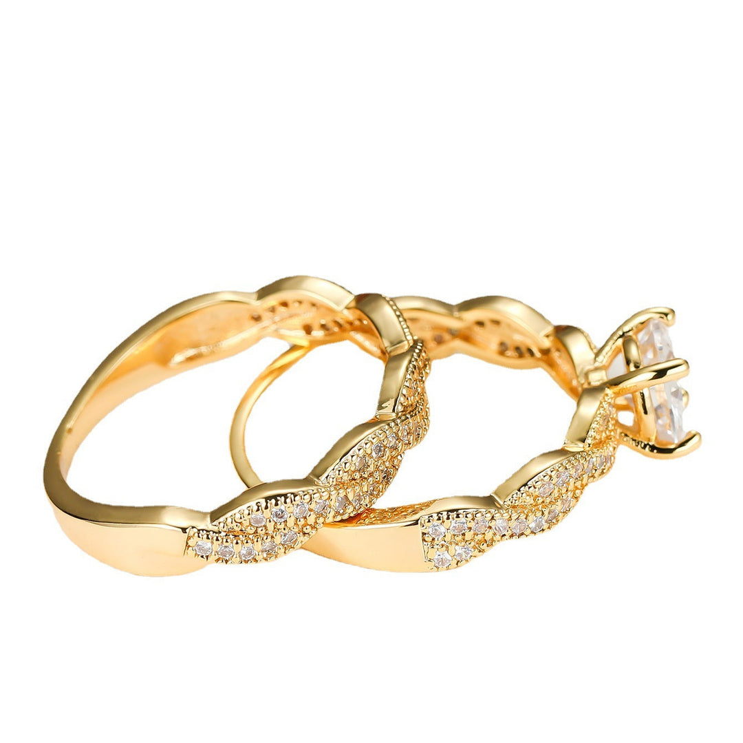 Simple Golden Four-claw Round Cross Twist Ring