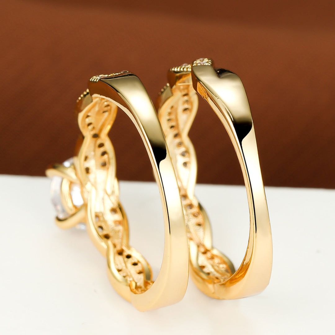 Simple Golden Four-claw Round Cross Twist Ring